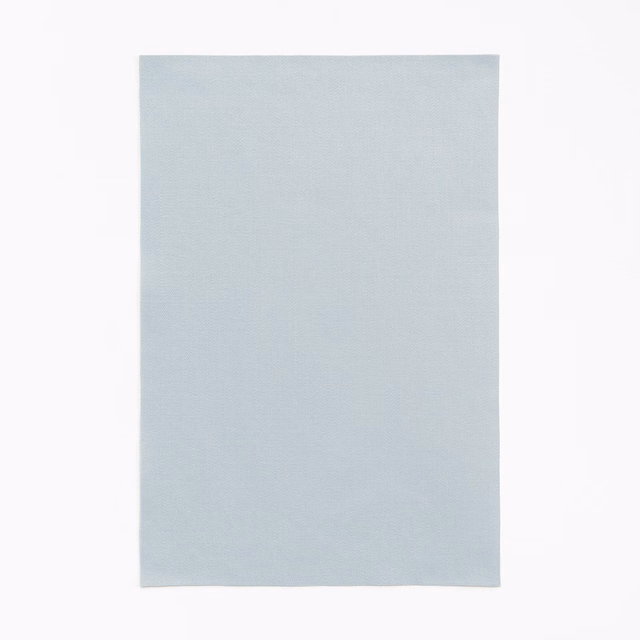 Pale ice-blue satin with a smooth surface and delicate horizontal sheen
