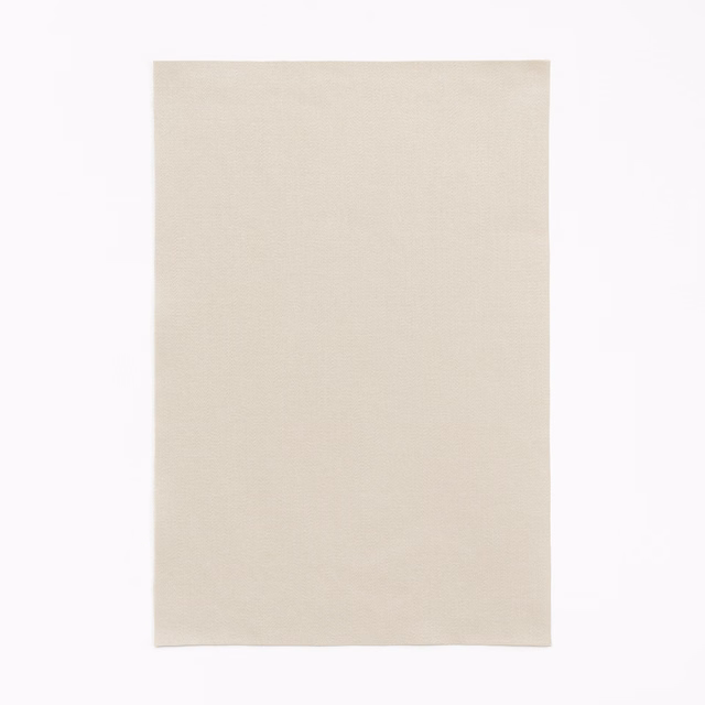 Pale warm greige satin fabric with a delicate, low-contrast surface sheen