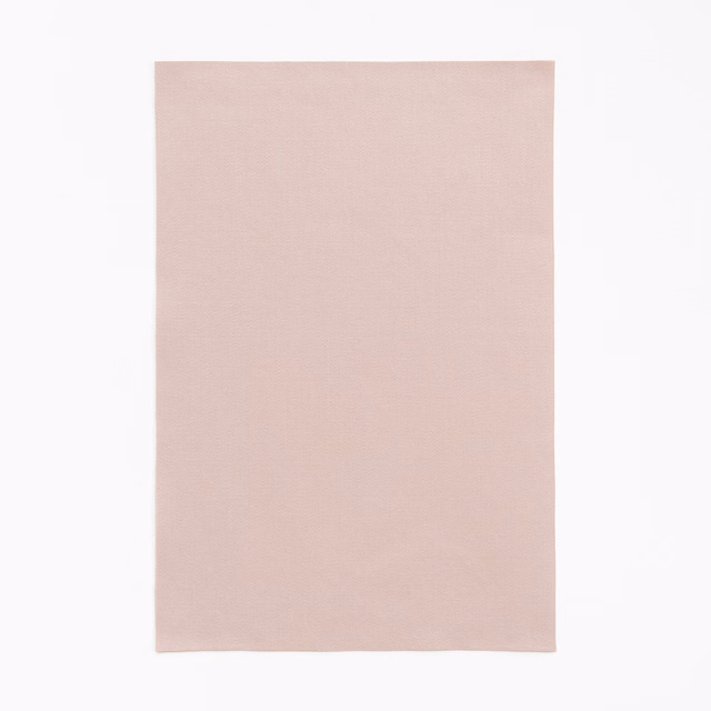 Pale dusty rose satin with a fine weave and restrained surface sheen