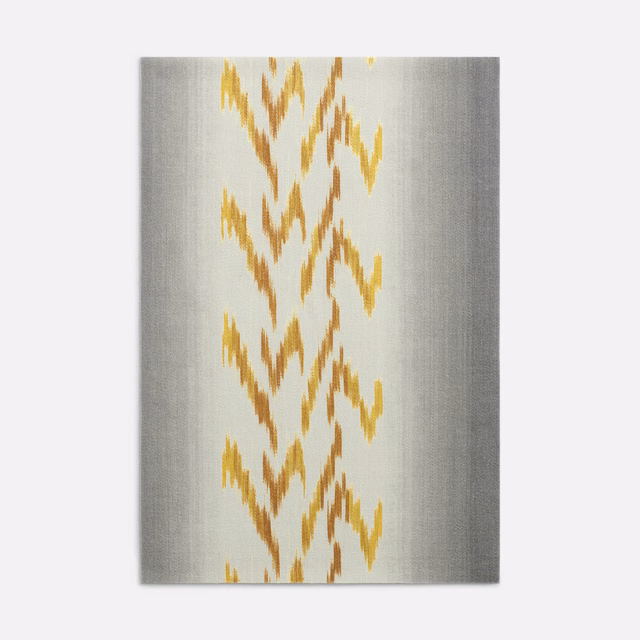 Silver-grey satin swatch with ivory ground and vertical ochre-gold ikat motifs