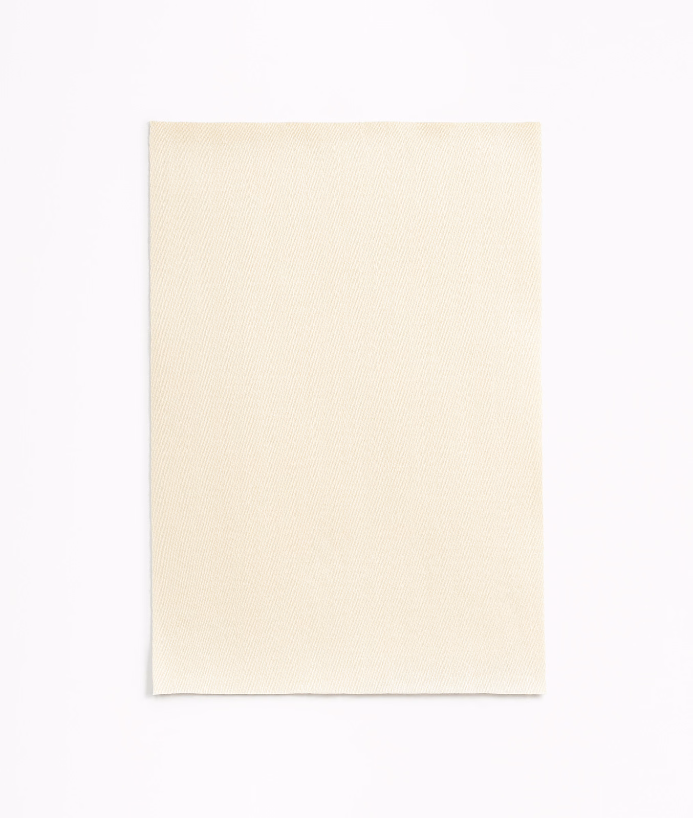 Warm ivory-cream satin swatch with a fine plain weave and soft surface sheen