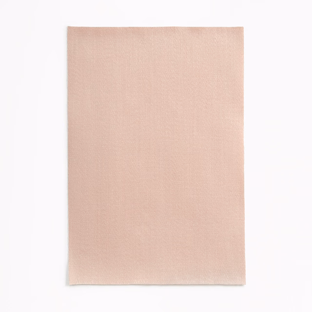Pale blush-pink satin with a fine, even weave and soft sheen