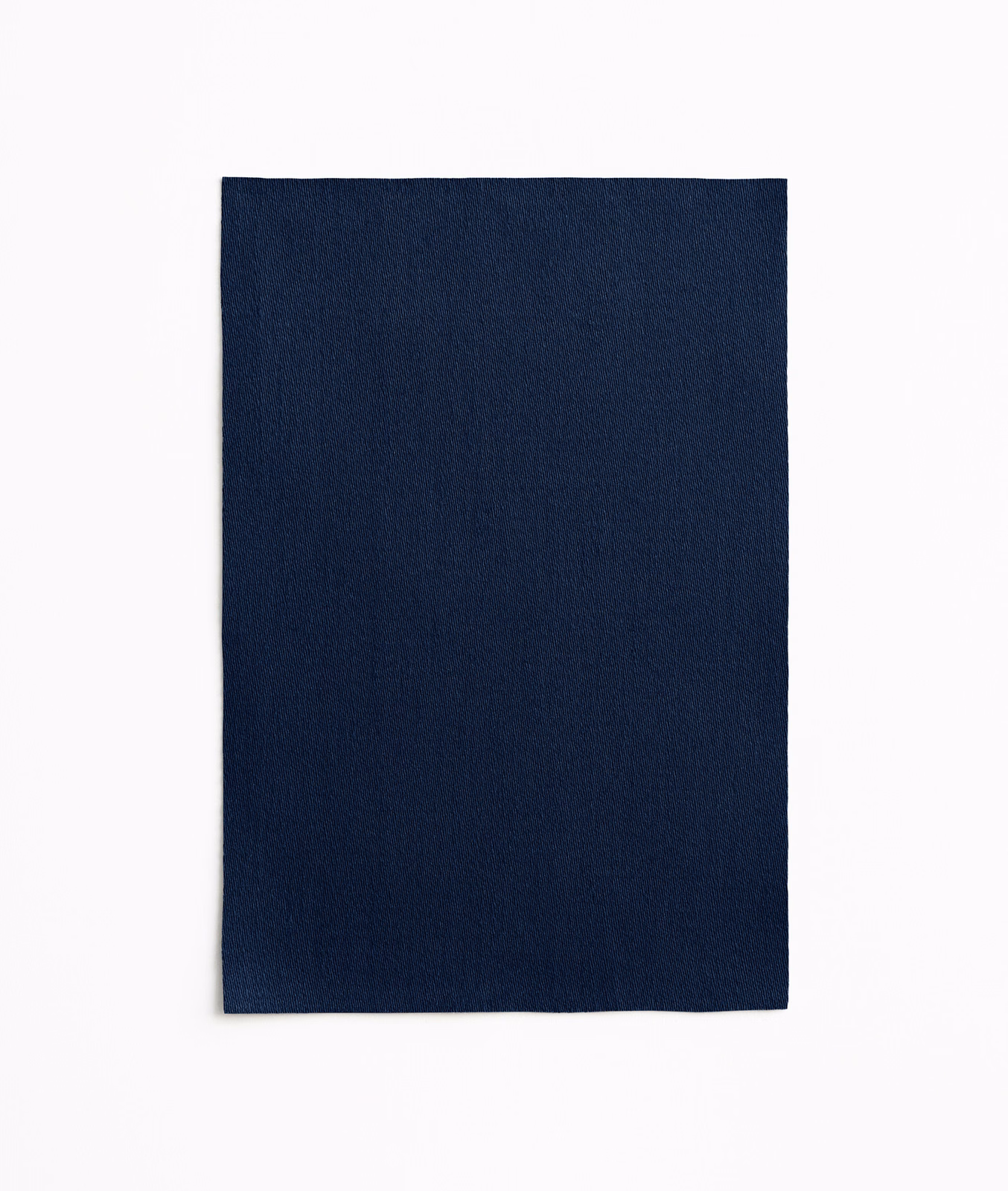 Deep indigo satin weave with subtle vertical sheen across a rectangular fabric swatch