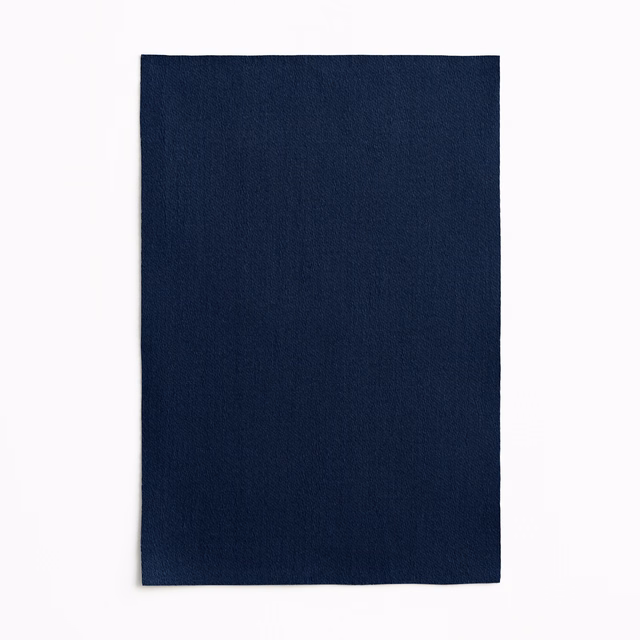 Deep indigo satin weave with subtle vertical sheen across a rectangular fabric swatch