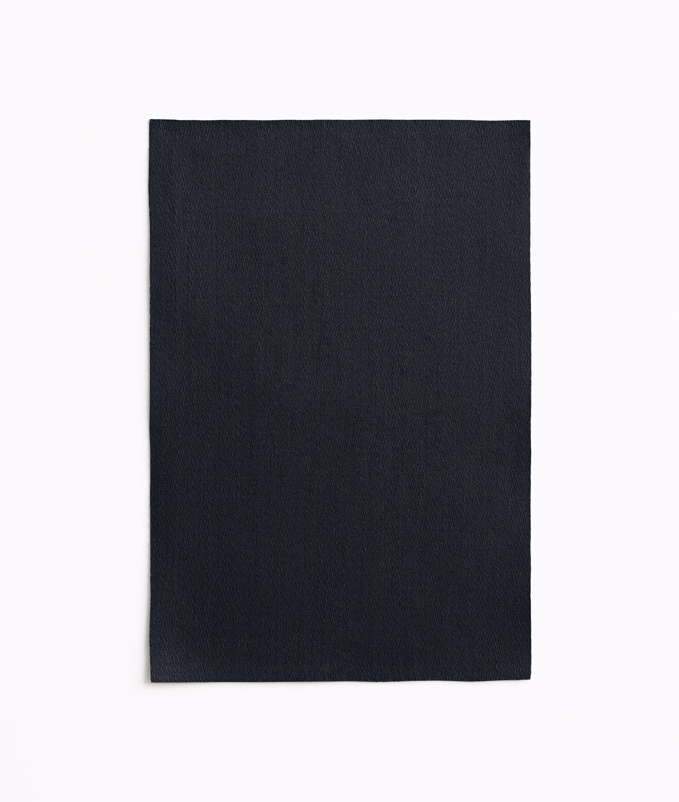Deep blue-black satin with fine vertical grain and a restrained surface sheen