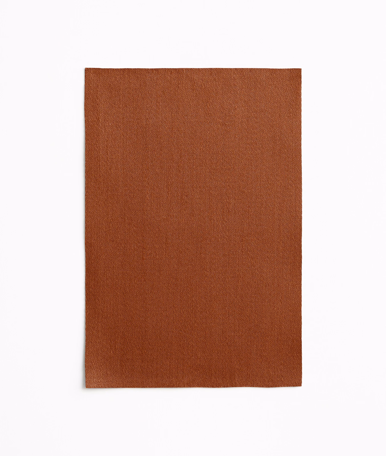 Warm terracotta swatch showing a close, subtly irregular woven texture