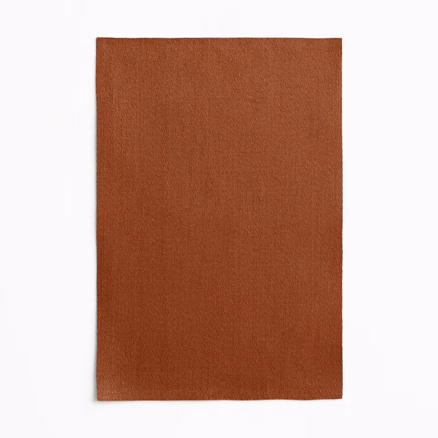 Warm terracotta swatch showing a close, subtly irregular woven texture