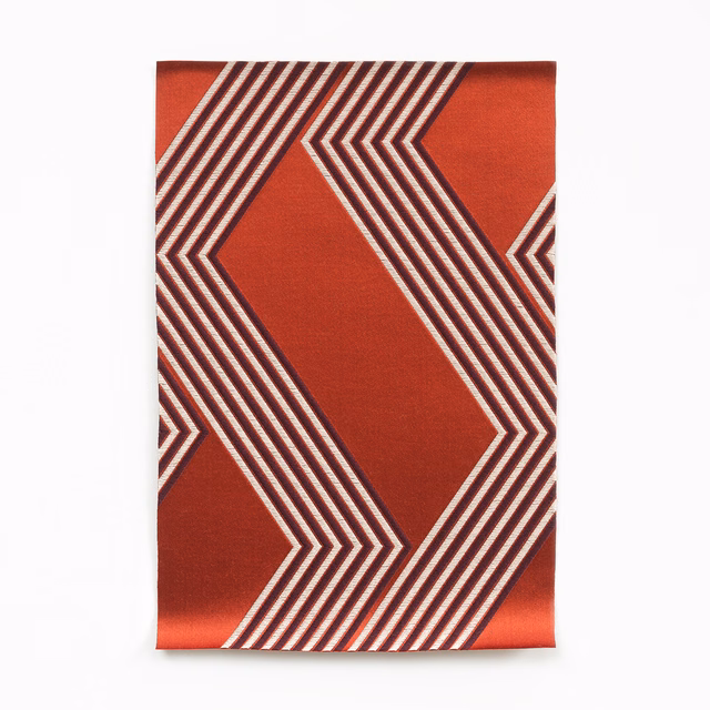 Deep coral satin with cream and dark geometric chevron stripes