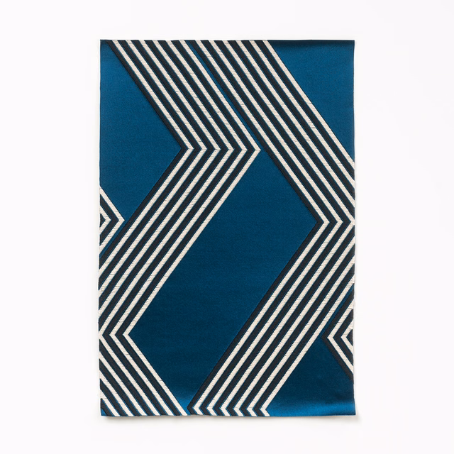 Deep teal satin swatch with ivory and charcoal angular chevron stripes
