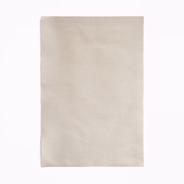 Pale beige satin swatch with subtle horizontal sheen and softly smooth texture