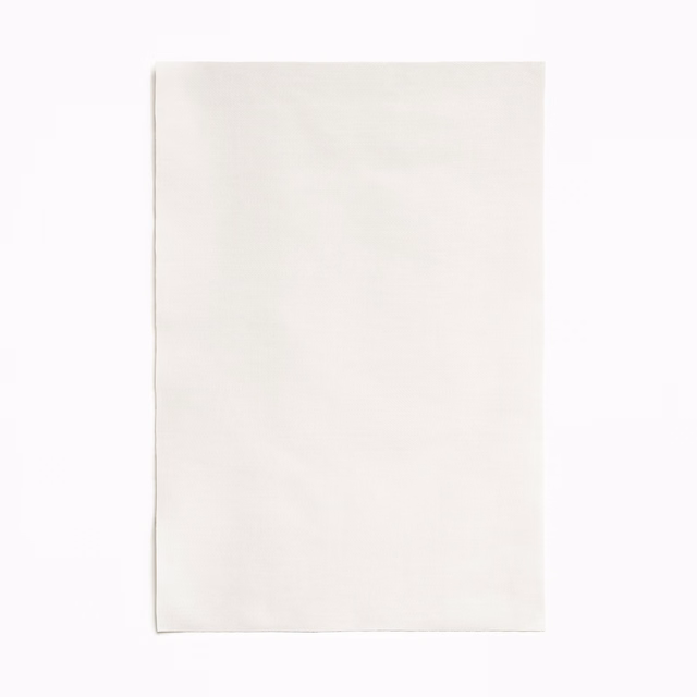 Smooth off-white satin swatch with a subtle, softly reflective surface