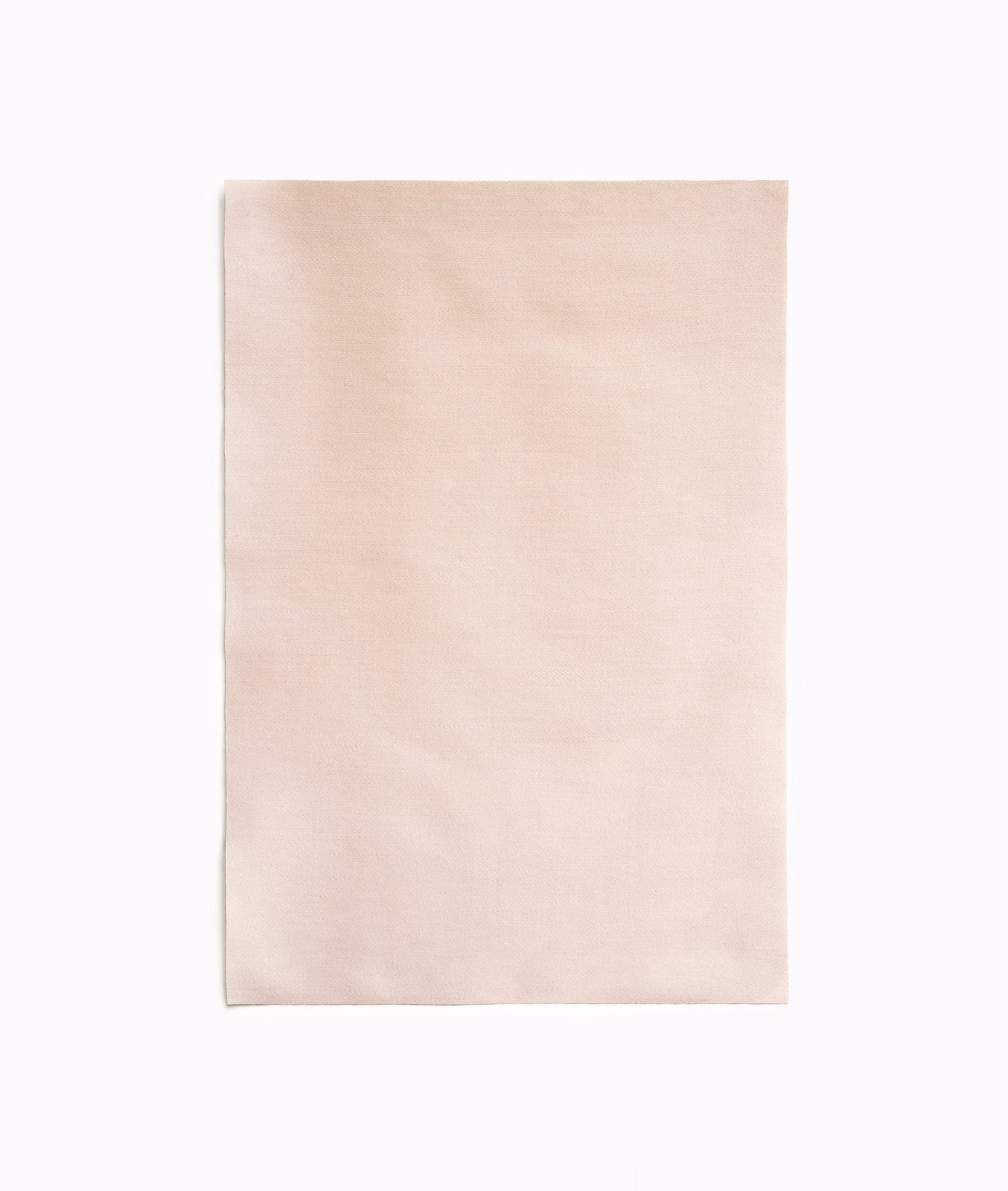 Pale blush-pink satin swatch with a smooth, softly lustrous surface