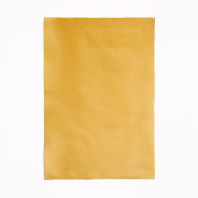 Warm mustard-gold satin swatch with a fine weave and softly shifting sheen