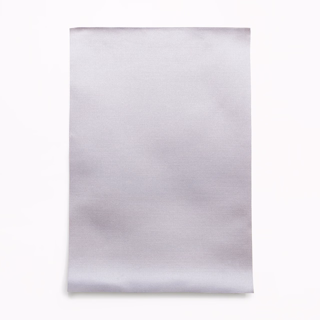 Pale cool lilac satin swatch with fine horizontal grain and silvery sheen