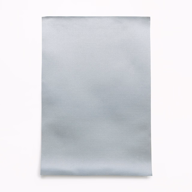 Pale blue-grey satin swatch with a soft horizontal sheen and subtle texture