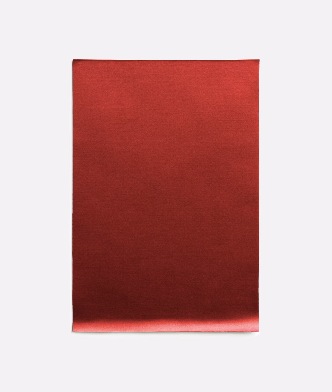 Deep ruby-red satin with fine horizontal grain and a soft reflected sheen