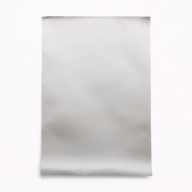 Pale pearl-grey satin swatch with soft horizontal sheen and curled lower edge