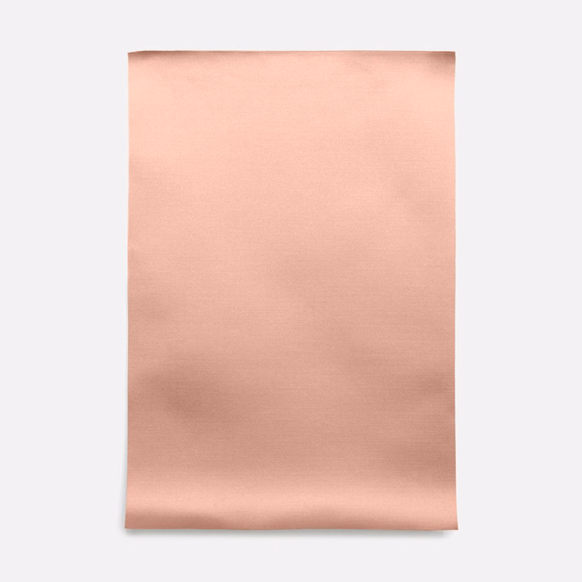 Warm salmon-pink satin with smooth face and subtle horizontal sheen