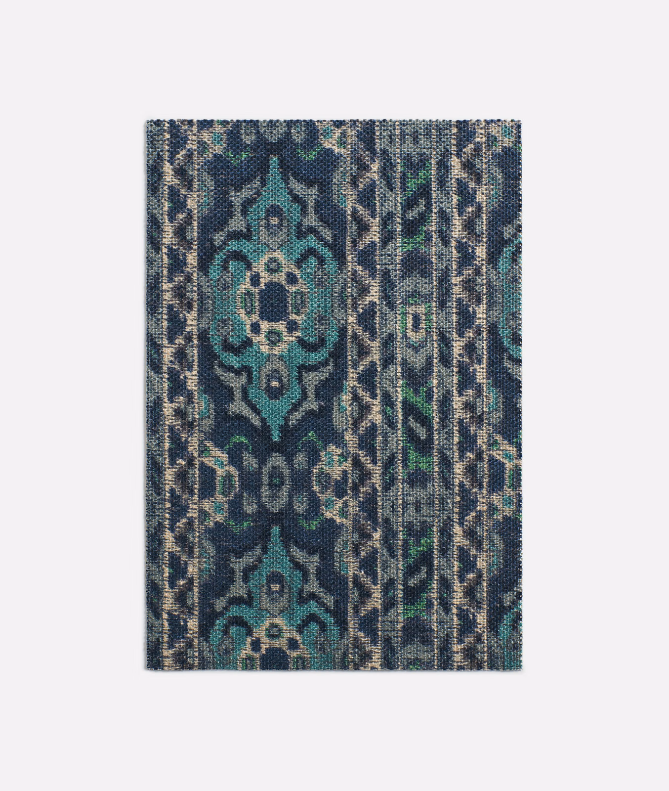 Deep indigo woven swatch with teal medallions, charcoal ground and ornamental vertical stripes