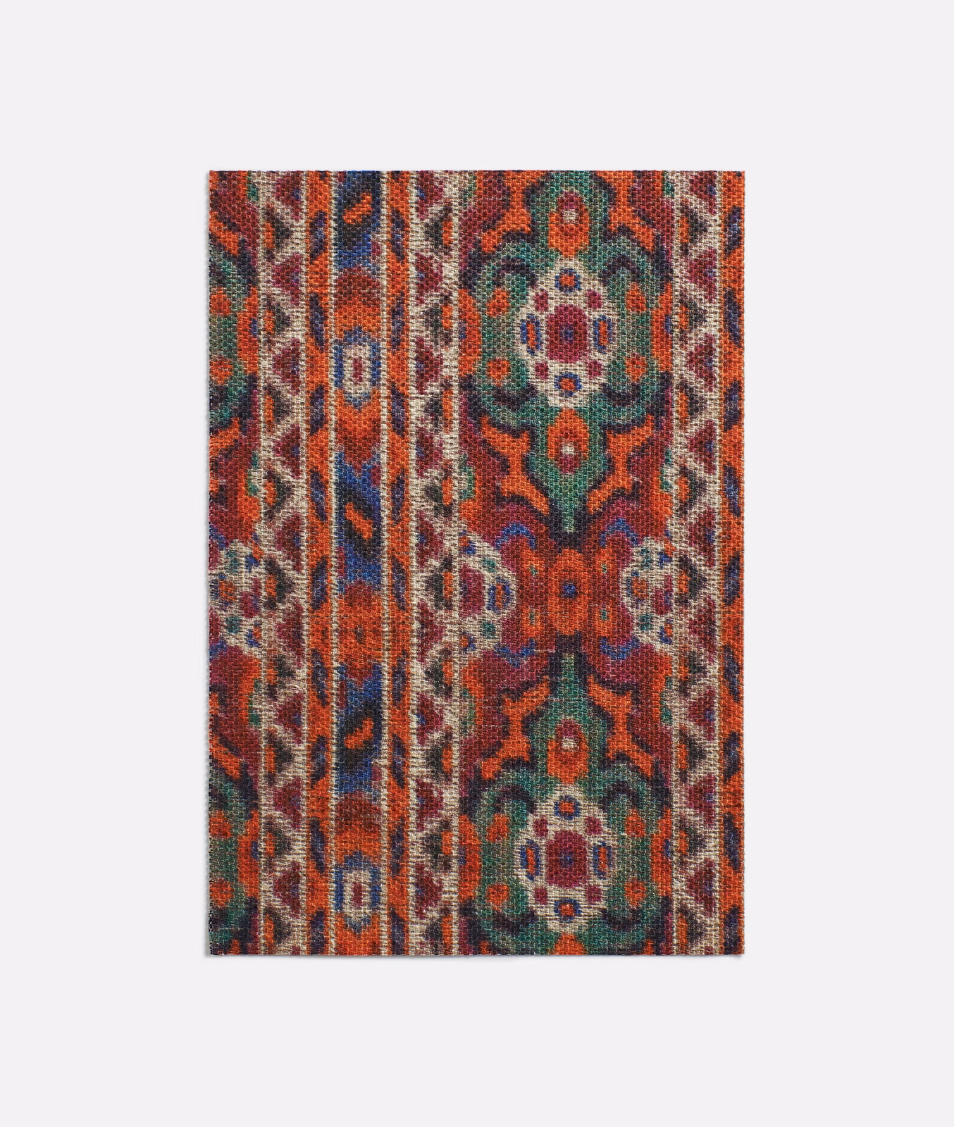 Rust, teal and navy woven fabric with vertical bands and Persian medallions