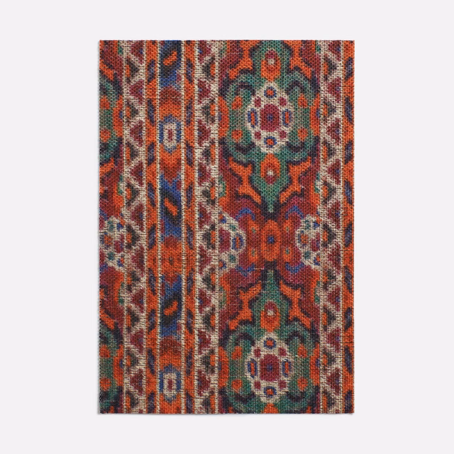 Rust, teal and navy woven fabric with vertical bands and Persian medallions