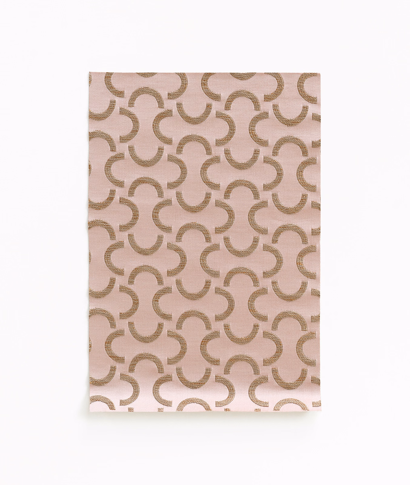 Blush vieux rose satin ground with repeating taupe curved arc motifs