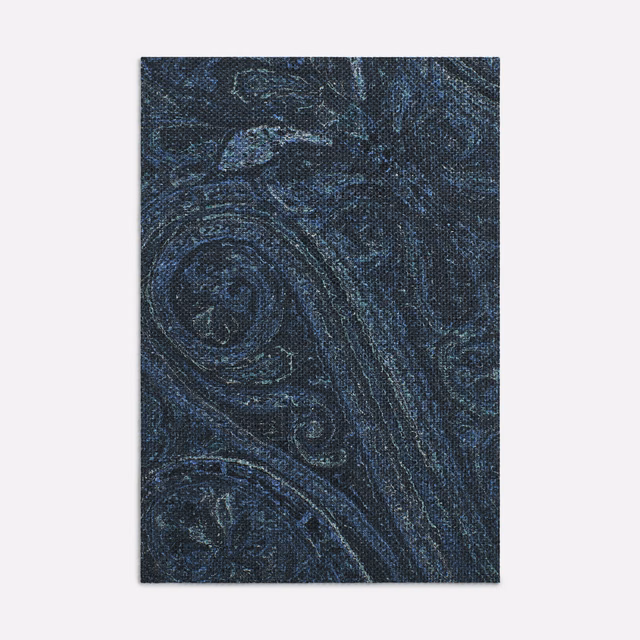 Deep indigo woven satin with blue-black paisley curls and subtle surface sheen