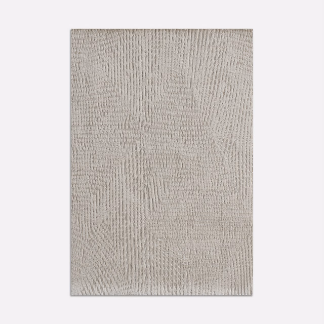 Pale silver satin with fine irregular ridges and softly shifting woven texture