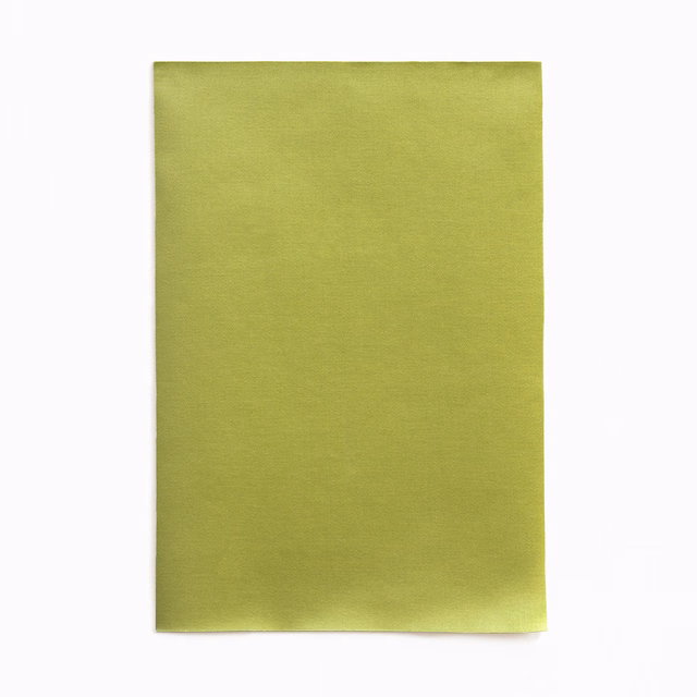 Plain absinthe green satin swatch with a smooth surface and soft vertical sheen
