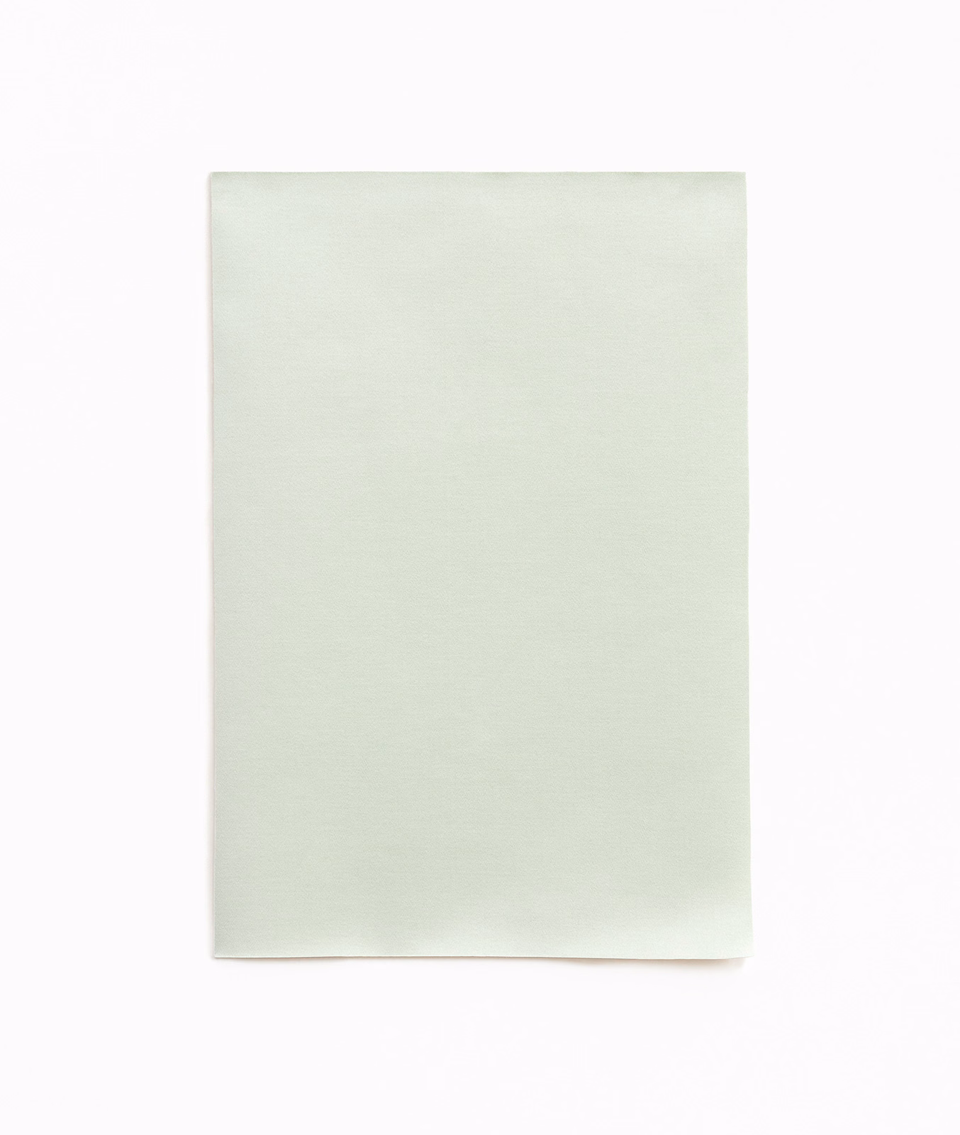 Pale mint-green satin swatch showing a smooth face and gentle understated sheen