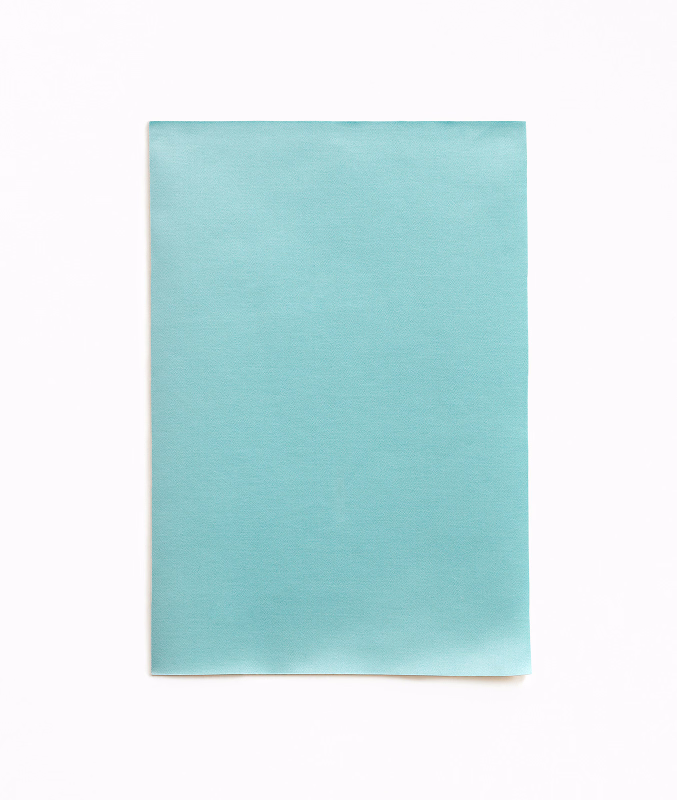Pale aqua-teal satin surface with subtle directional sheen