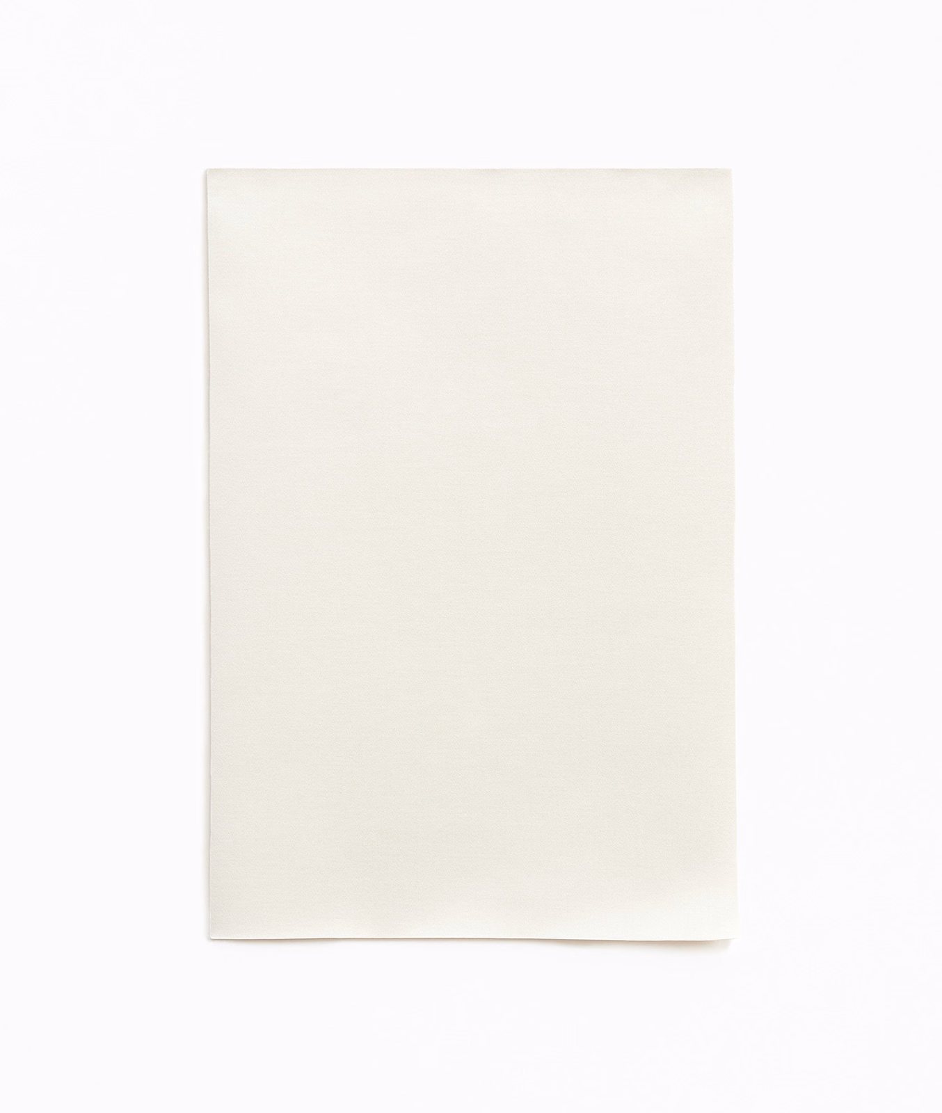 Warm ivory plain satin swatch with a smooth, subtly reflective surface