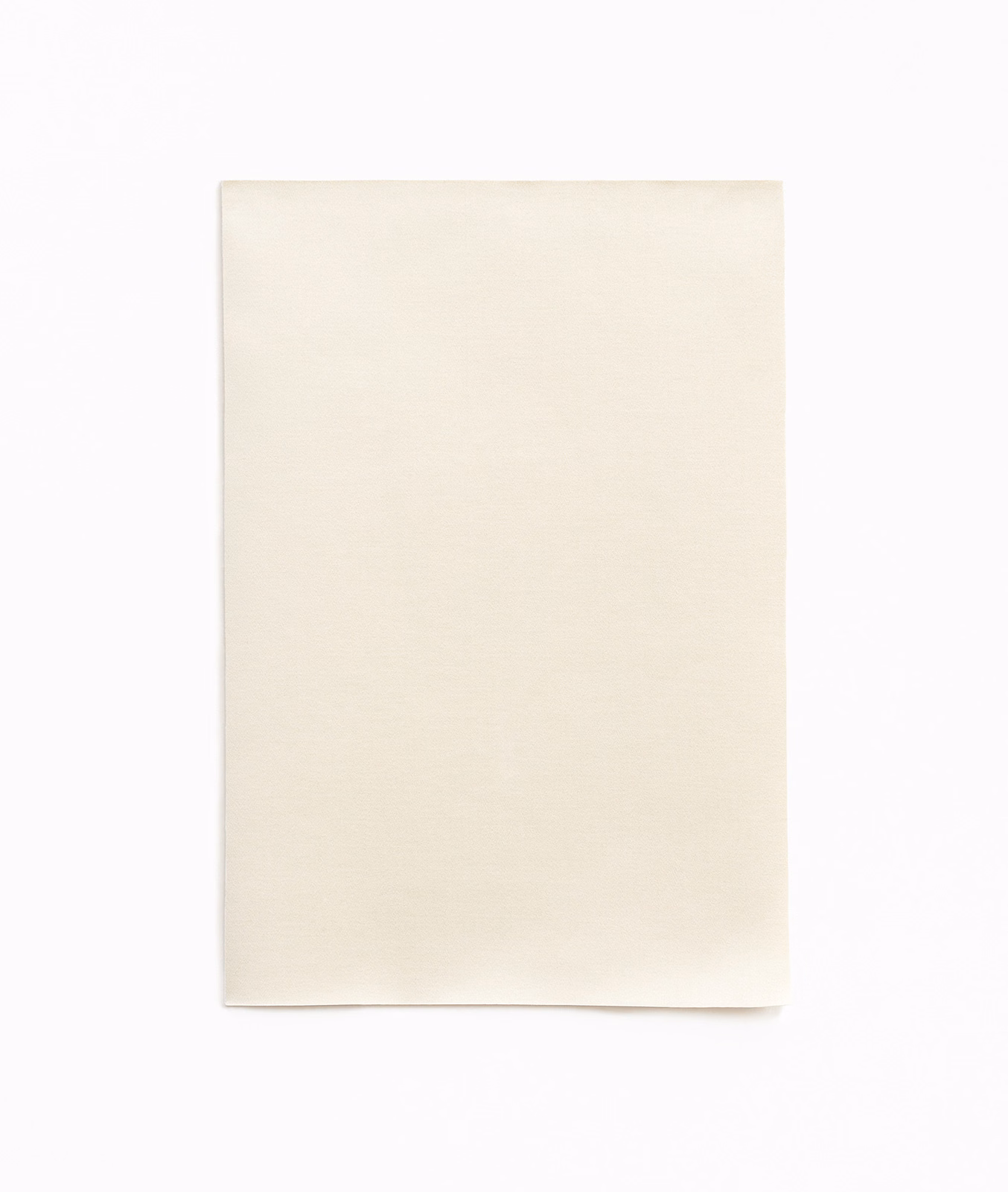 Warm champagne ivory satin swatch with a smooth plain weave and subtle sheen