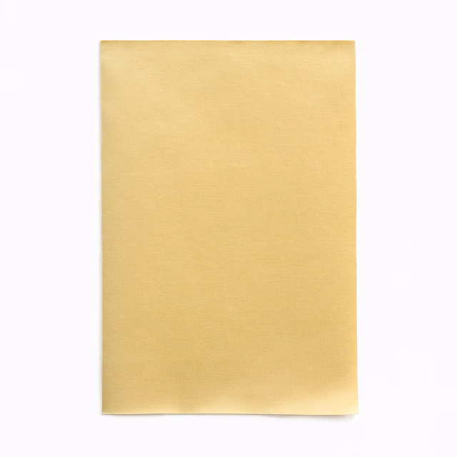 Pale honey-gold satin swatch with a smooth surface and soft reflective sheen