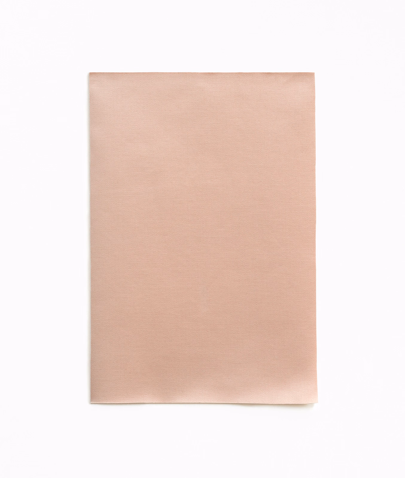Pale blush nude satin swatch with a smooth, softly luminous horizontal texture