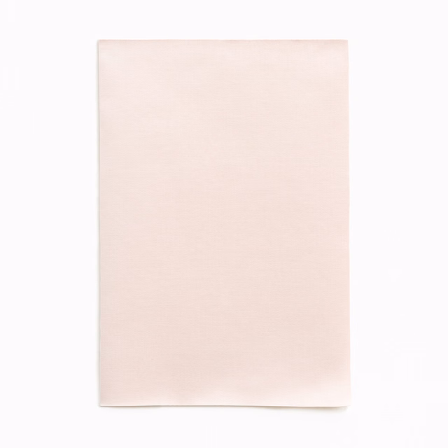 Pale blush-pink satin swatch with a soft, even surface sheen