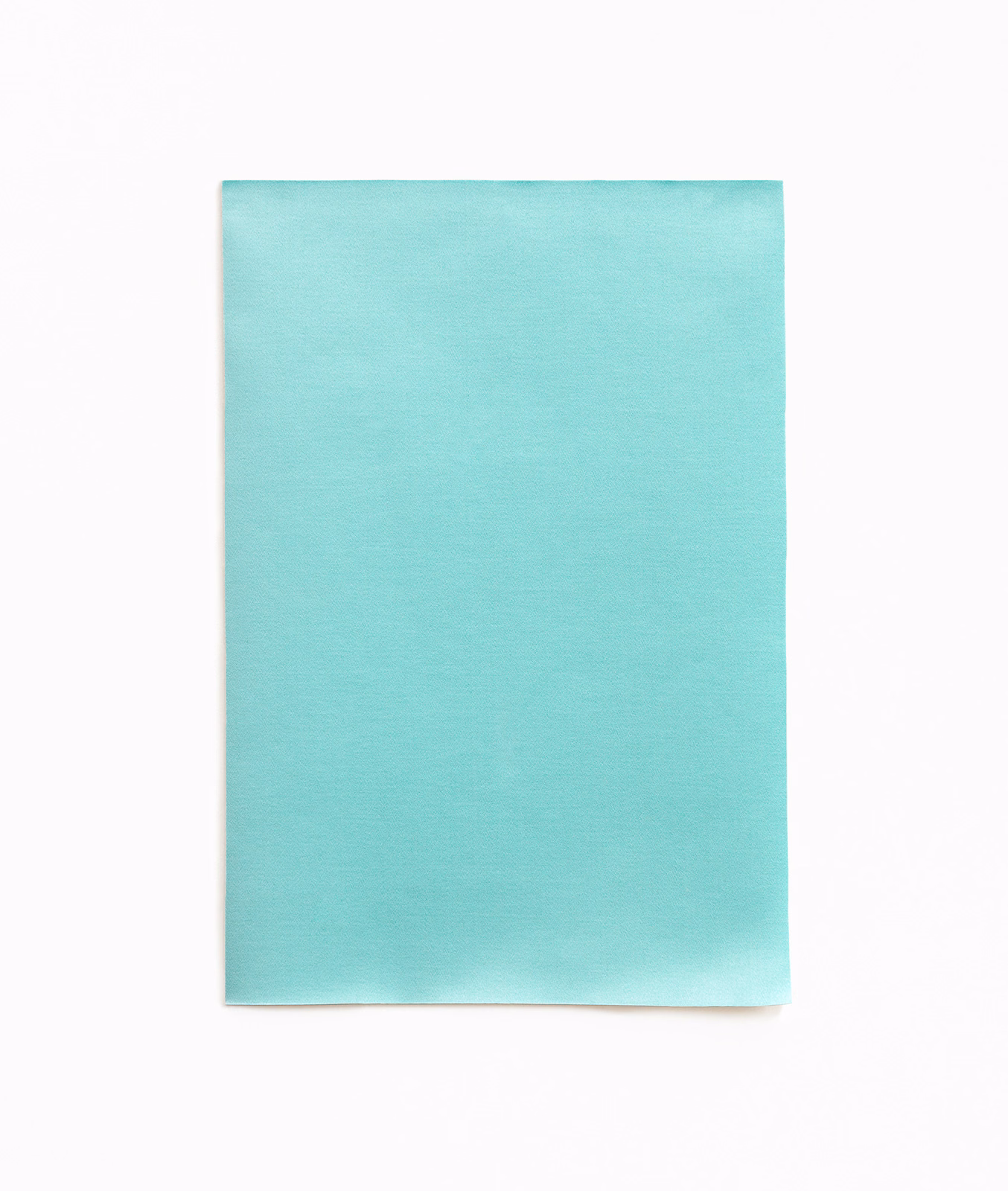 Close-up of smooth turquoise satin with soft aqua sheen and fine horizontal grain