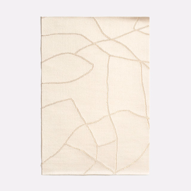 Warm ivory satin with delicate taupe looping lines and a subtle sheen