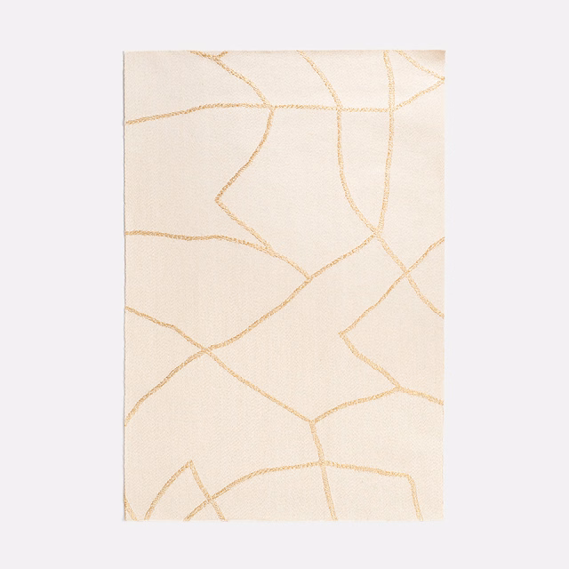 Pale ivory satin with irregular champagne lines and a softly lustrous surface