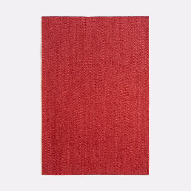 Deep cerise-red fabric swatch showing fine vertical weave and softly textured surface