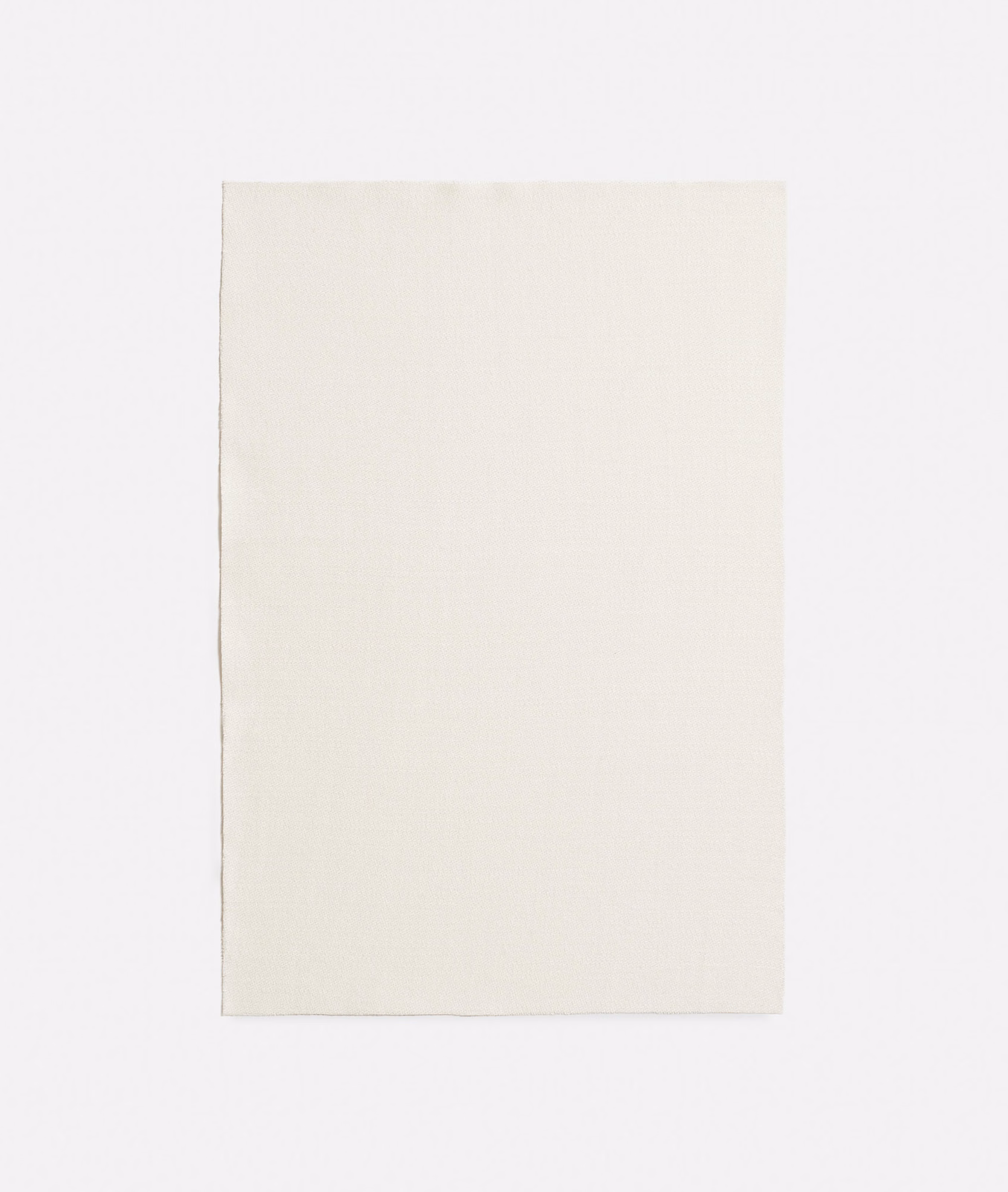 Warm ivory satin swatch with a smooth surface and soft reflective sheen