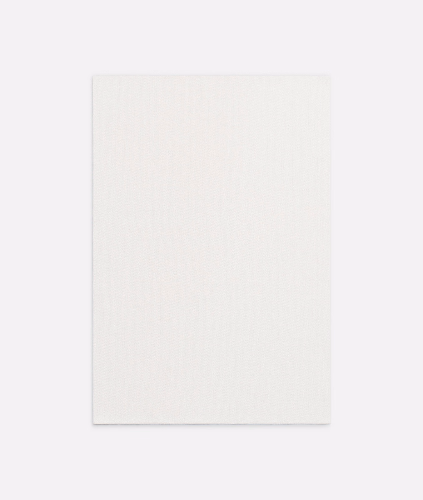 Near-white Bianco textile swatch with delicate vertical ribbing and soft ivory tone