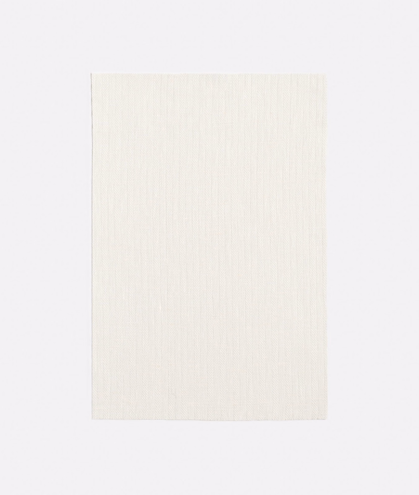 Soft ivory sheer with fine vertical weave and barely visible chevron texture