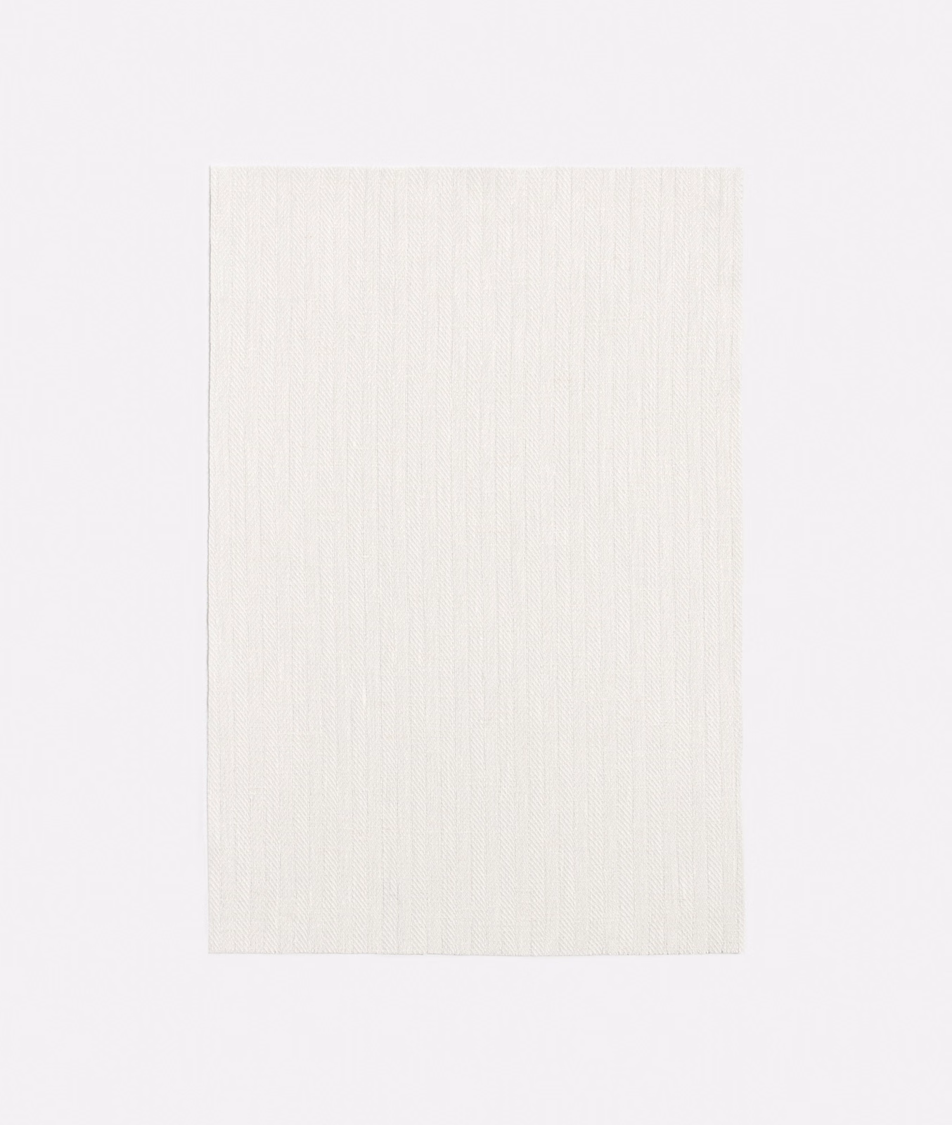 Soft ivory sheer with faint chevron lines and a fine vertical weave