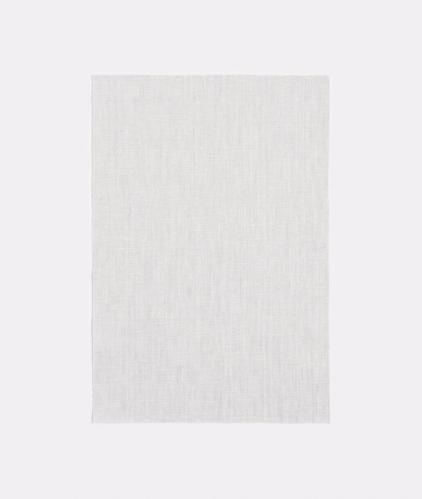 Icy white sheer swatch with fine weave and barely visible chevron texture