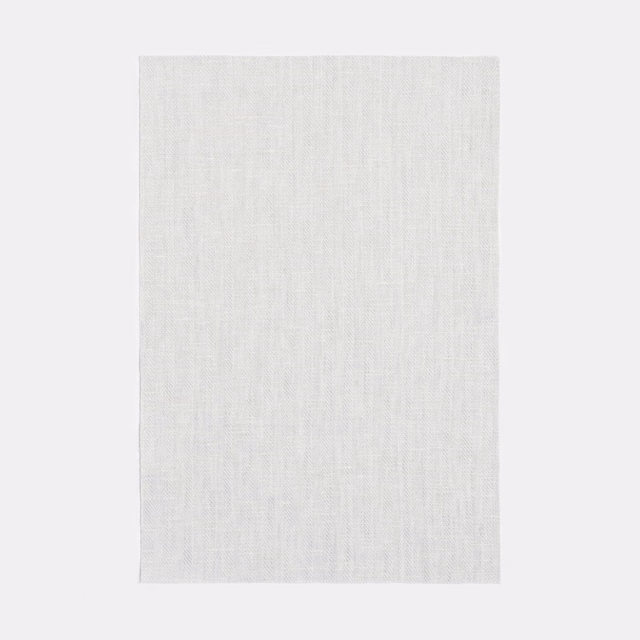 Icy white sheer swatch with fine weave and barely visible chevron texture