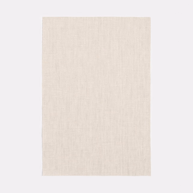 Pale warm ivory swatch with a fine, faint chevron weave and soft texture