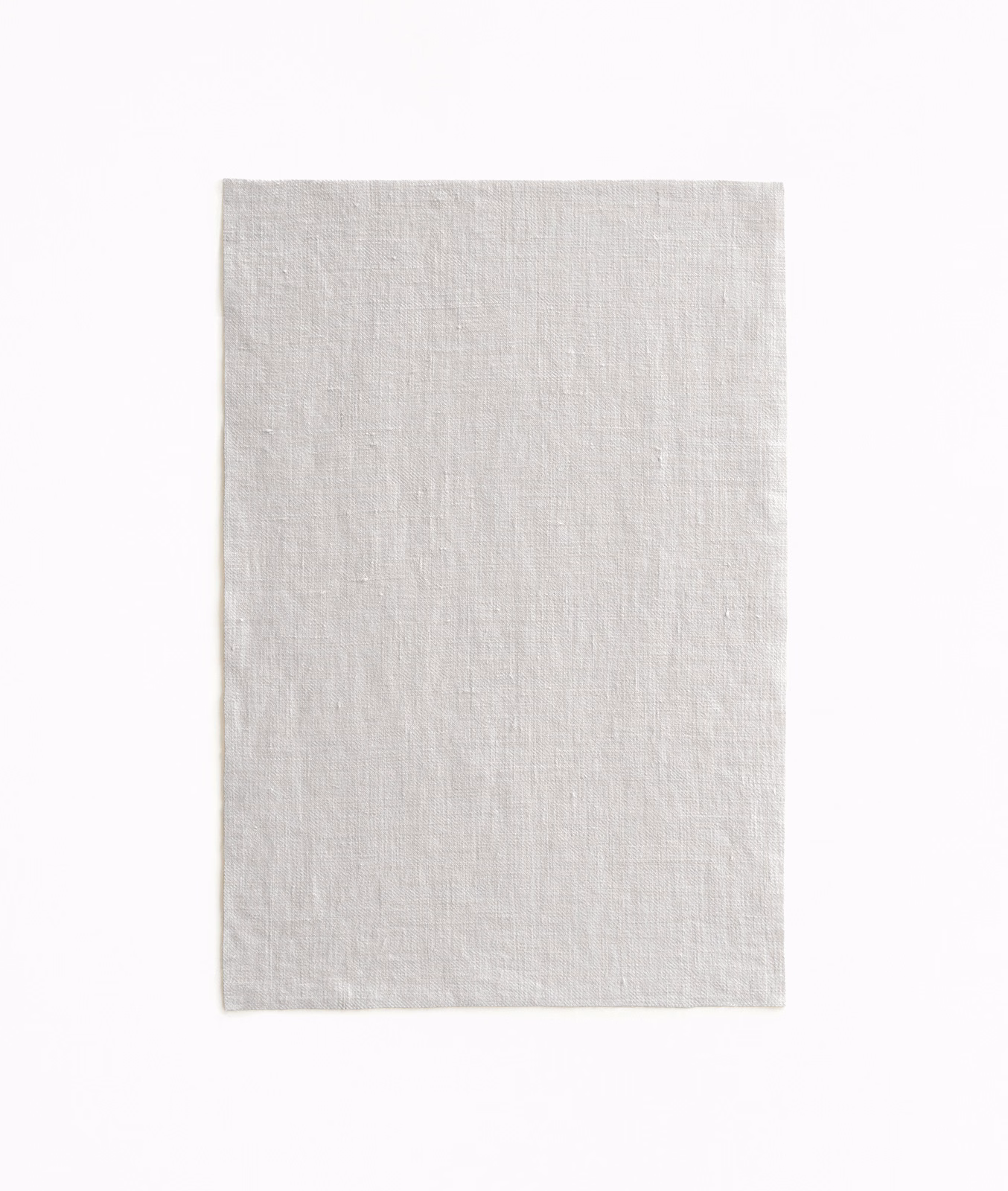 Pale silver-grey sheer fabric swatch showing a fine irregular woven texture