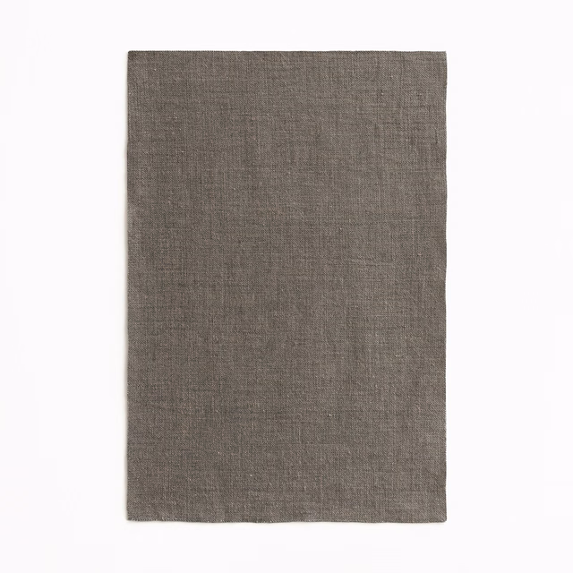 Warm charcoal grey sheer swatch with a fine, subtly irregular woven texture