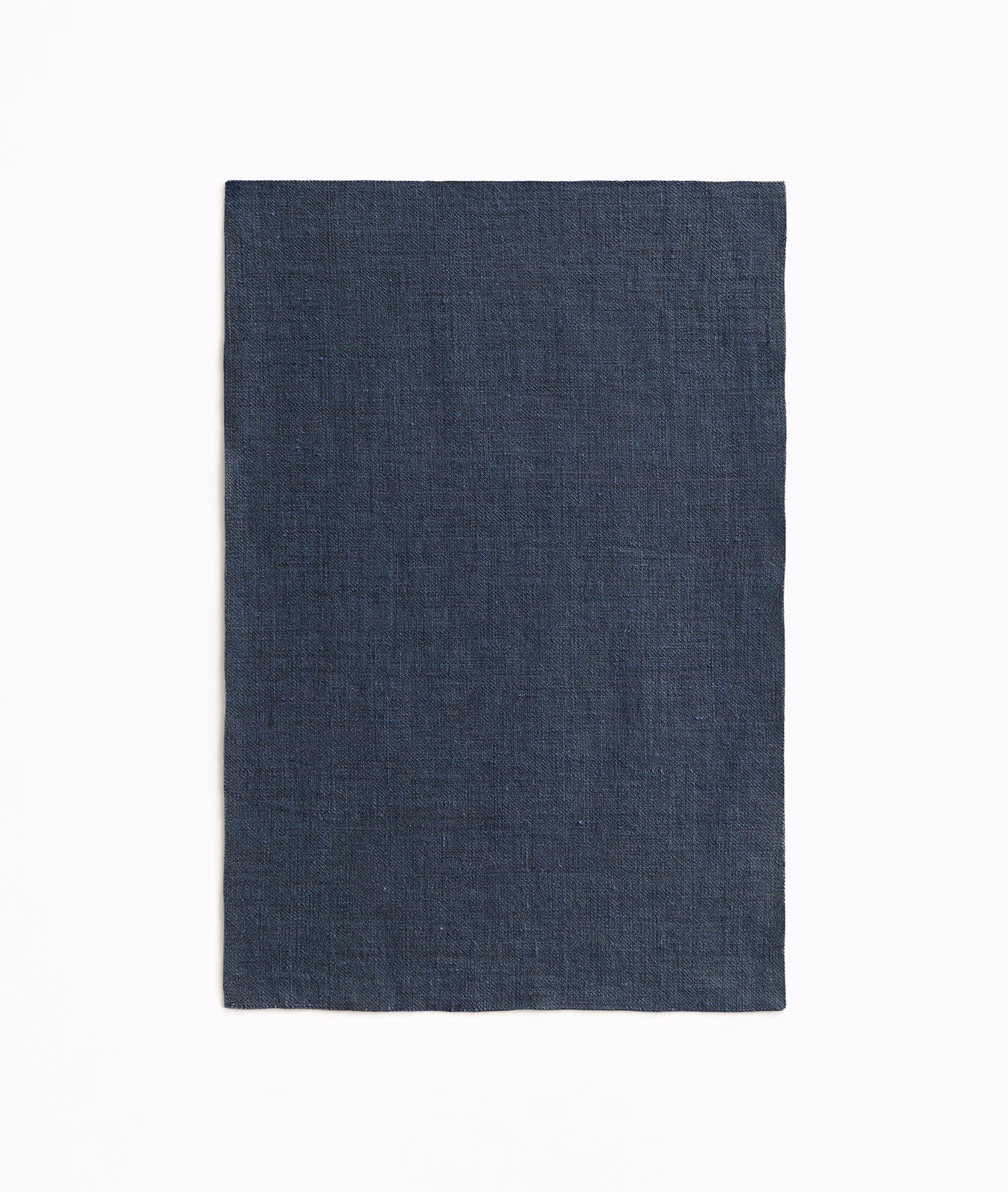 Deep indigo-blue sheer cloth with a fine, subtly crosshatched woven texture